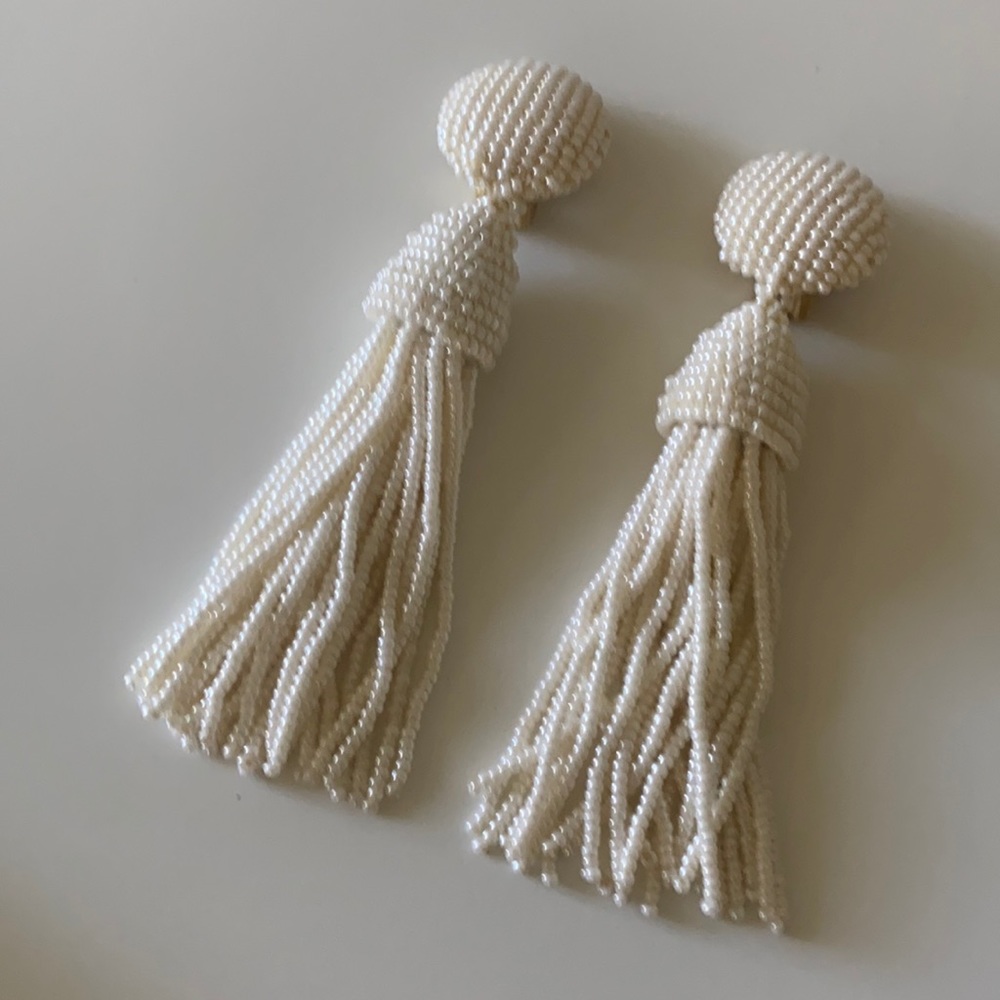 Short beaded tassel clip on earrings